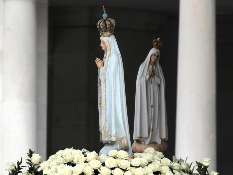 Imagem venerada na Capelinha das Aparições e Imagem Peregrina de Nossa Senhora de Fátima (Lusa)